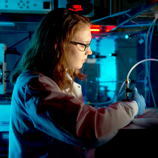 Heather Ricker, a Skidmore college student, conducts an experiment in a chemistry lab